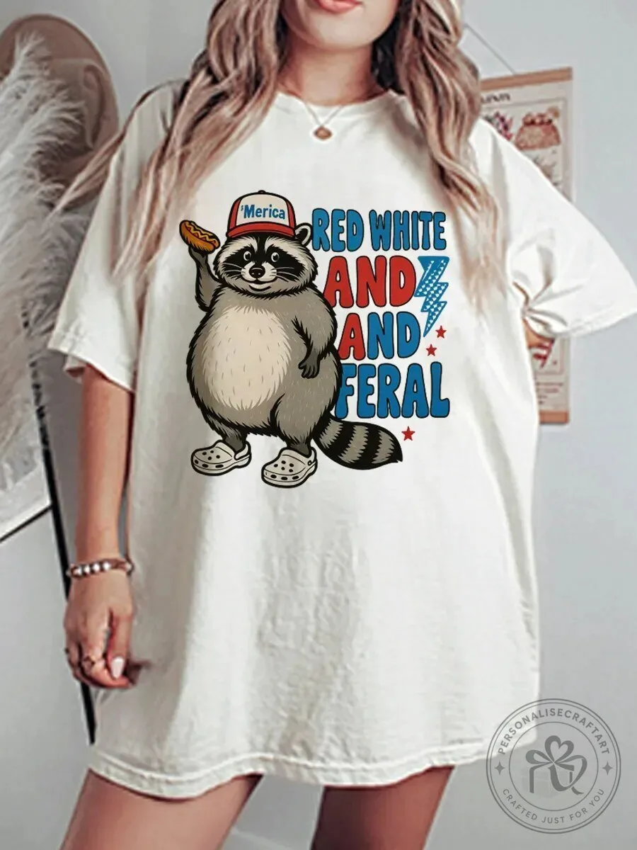 Red White And Feral Raccoon Eating Hot Dog Funny Patriotic T-Shirt